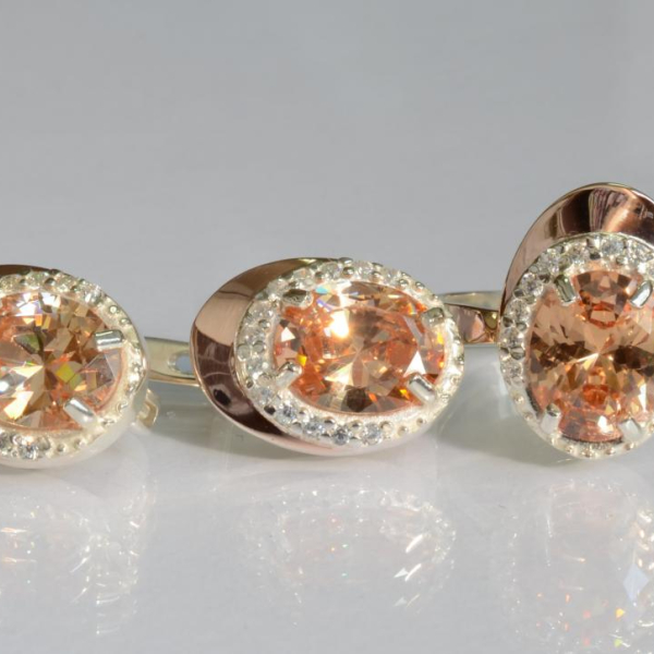 Срібний набір з золотими пластинами