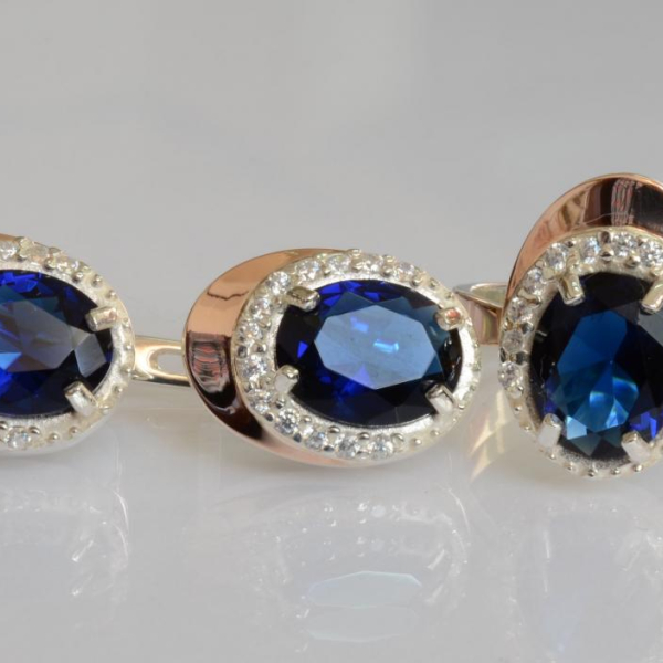 Срібний набір з золотими пластинами