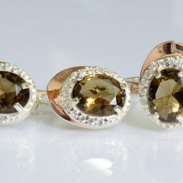 Срібний набір з золотими пластинами