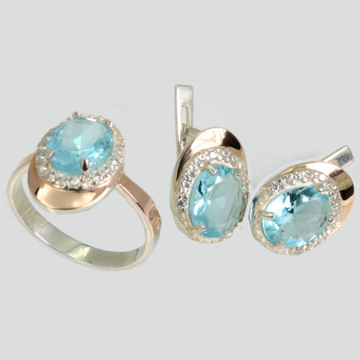 Срібний набір з золотими пластинами