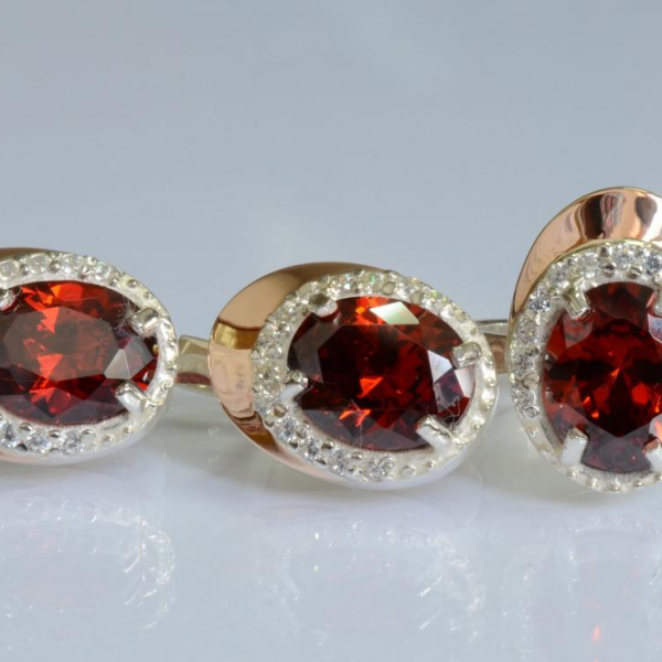 Срібний набір з золотими пластинами