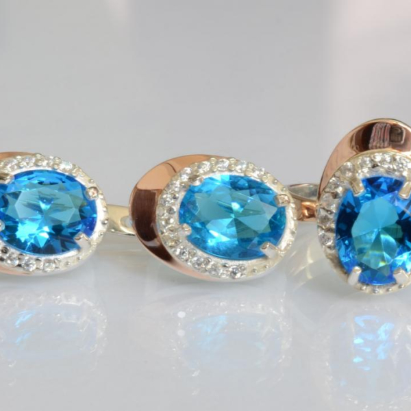 Срібний набір з золотими пластинами