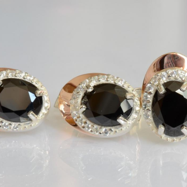 Срібний набір з золотими пластинами