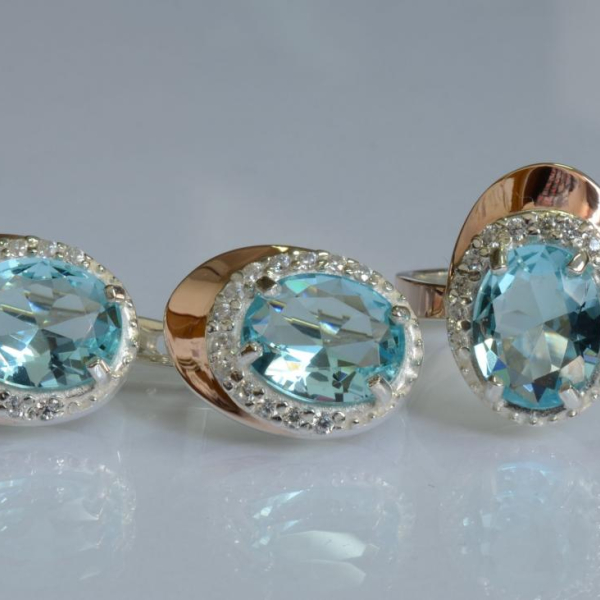 Срібний набір з золотими пластинами