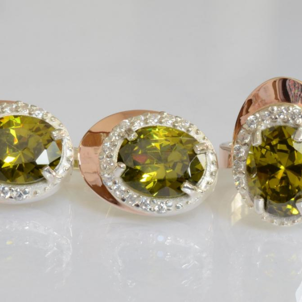 Срібний набір з золотими пластинами