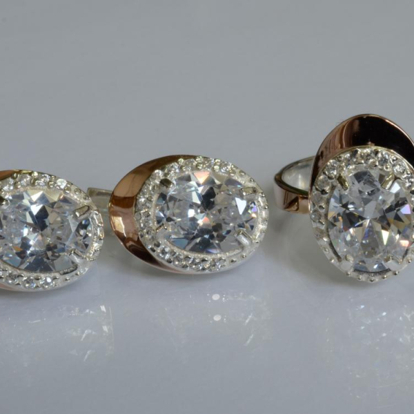 Срібний набір з золотими пластинами