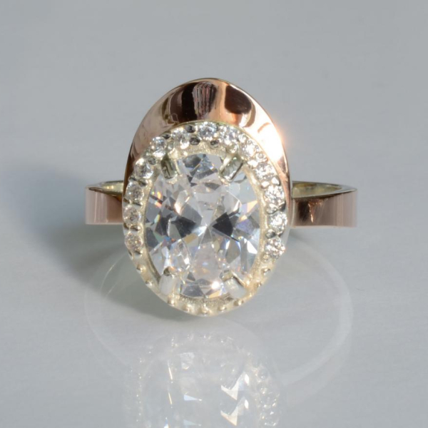 Срібна каблучка з золотими вставками