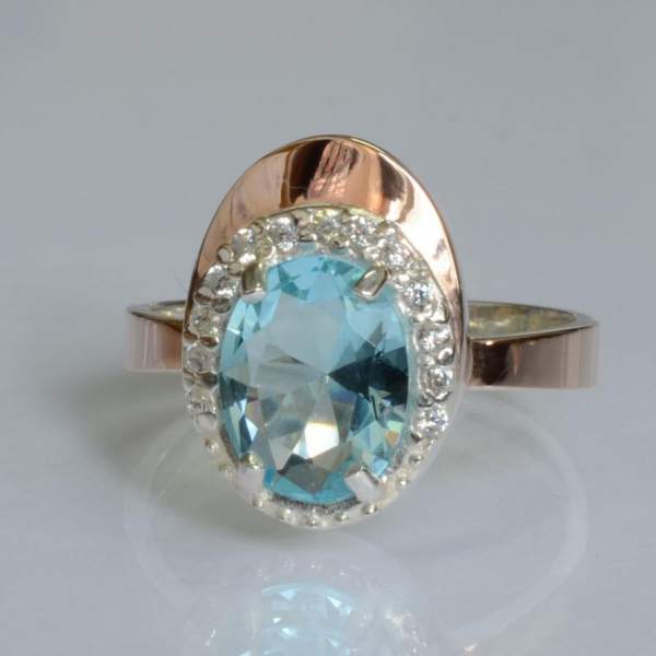 Срібна каблучка з золотими вставками