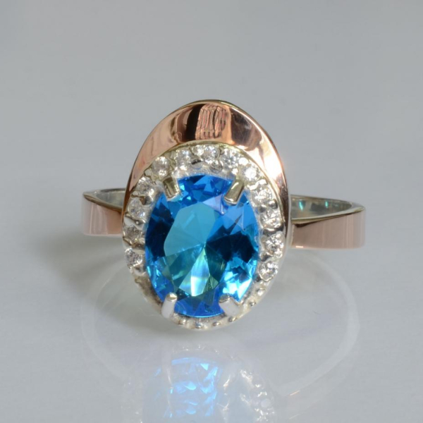 Срібна каблучка з золотими вставками