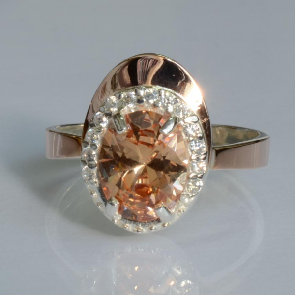 Срібна каблучка з золотими вставками