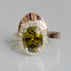 Срібна каблучка з золотими вставками