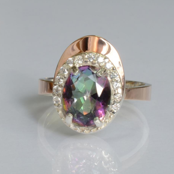 Срібна каблучка з золотими вставками