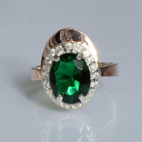 Срібна каблучка з золотими вставками