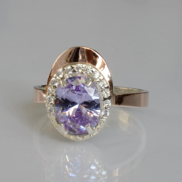 Срібна каблучка з золотими вставками