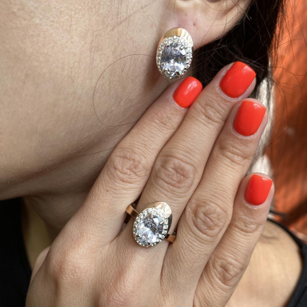 Срібна каблучка з золотими вставками