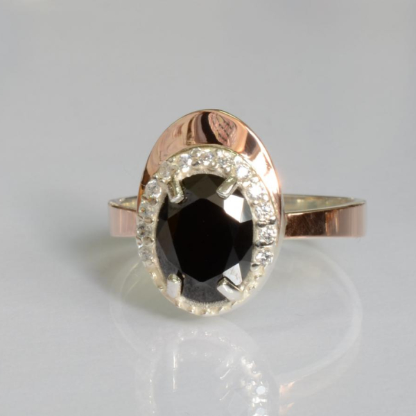 Срібна каблучка з золотими вставками