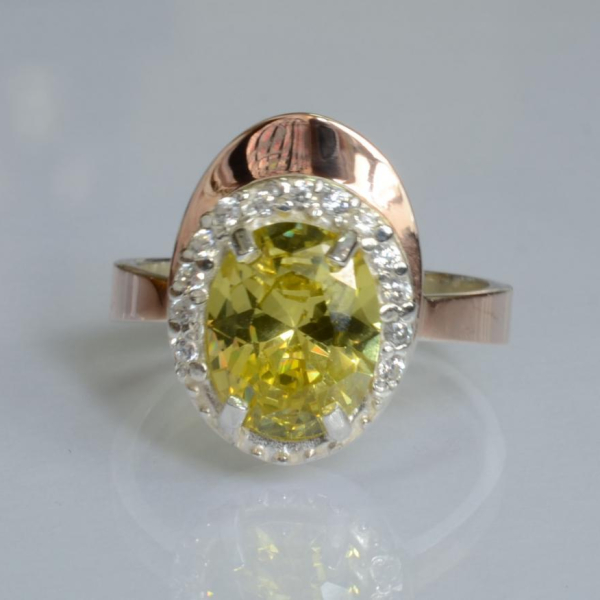 Срібна каблучка з золотими вставками