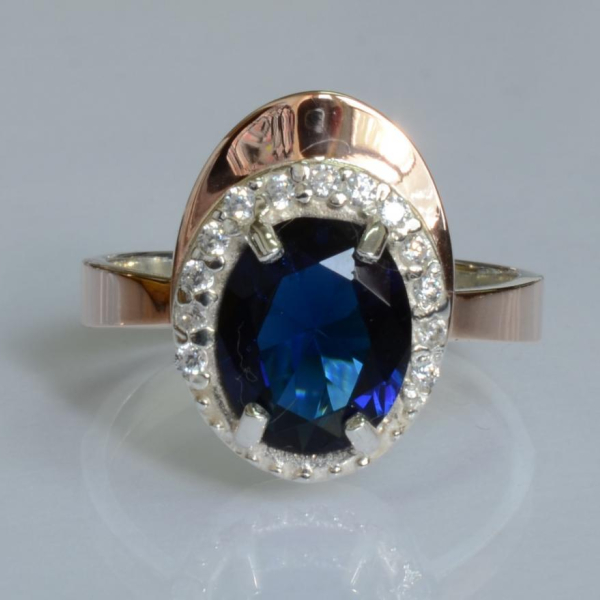 Срібна каблучка з золотими вставками