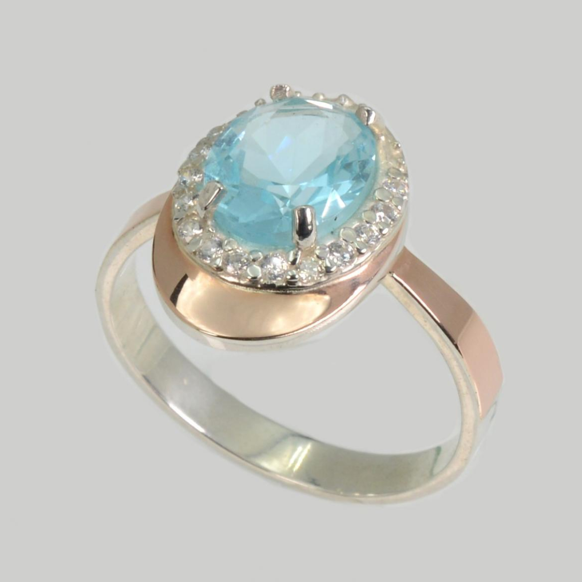 Срібна каблучка з золотими вставками