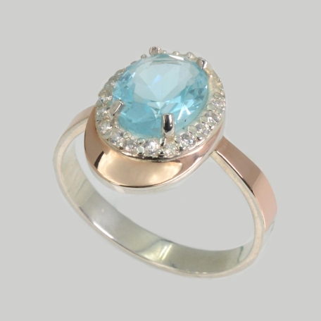 Срібна каблучка з золотими вставками