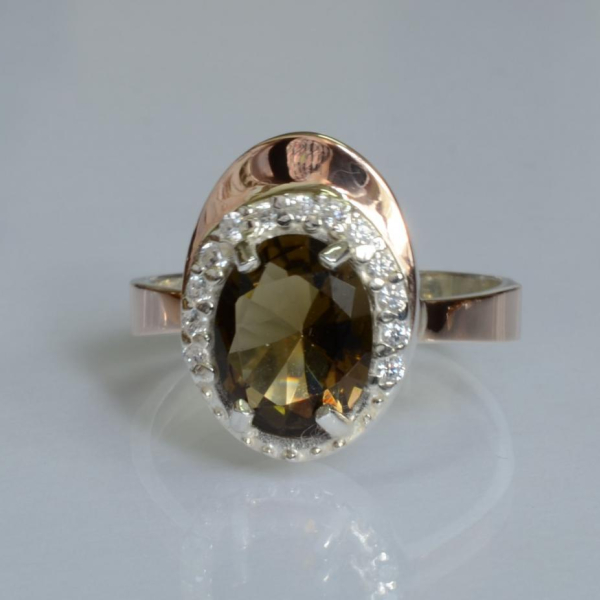 Срібна каблучка з золотими вставками