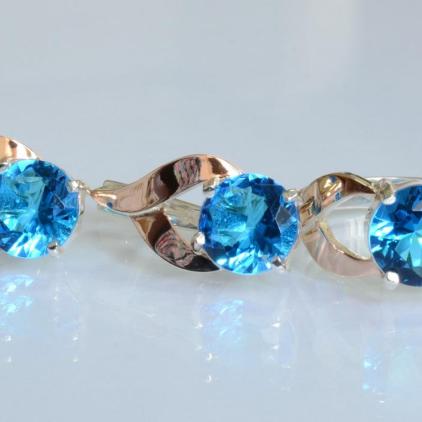 Срібний набір з золотими пластинами