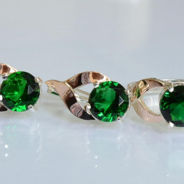 Срібний набір з золотими пластинами