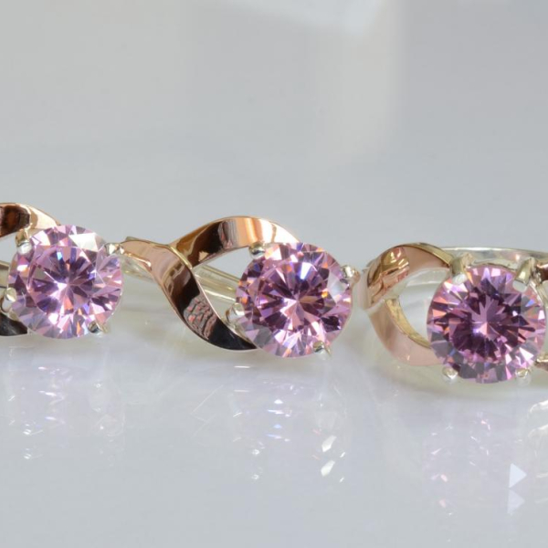 Срібний набір з золотими пластинами