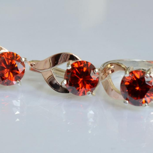 Срібний набір з золотими пластинами