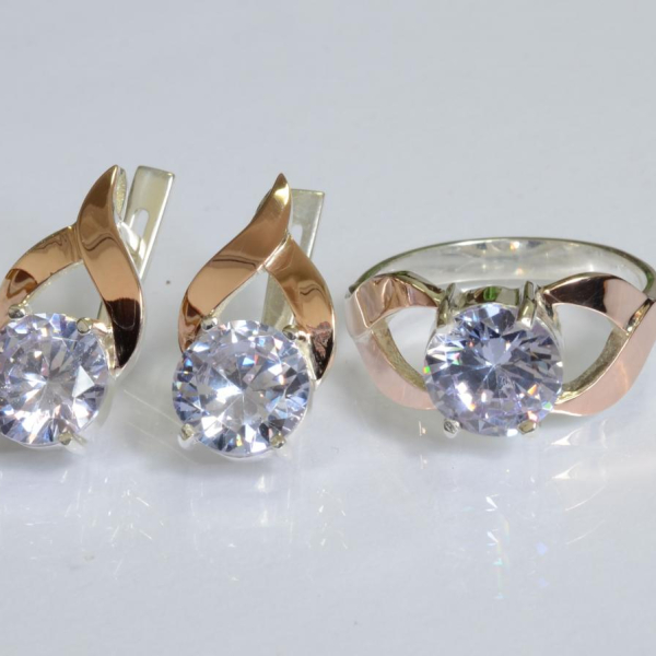 Срібний набір з золотими пластинами