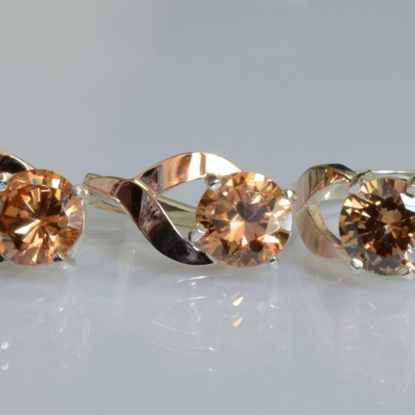 Срібний набір з золотими пластинами