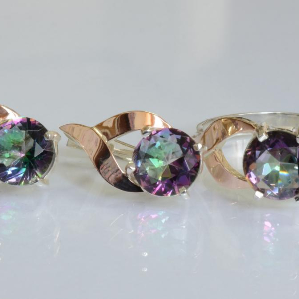 Срібний набір з золотими пластинами