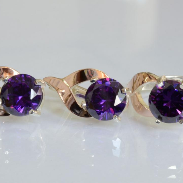 Срібний набір з золотими пластинами