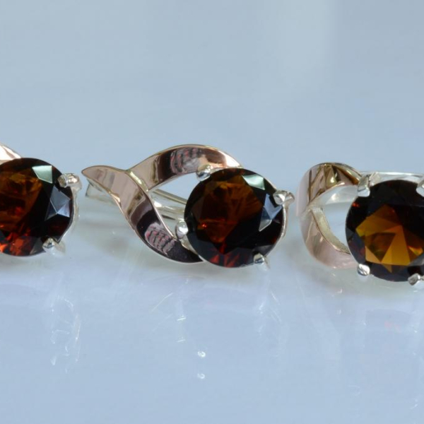 Срібний набір з золотими пластинами