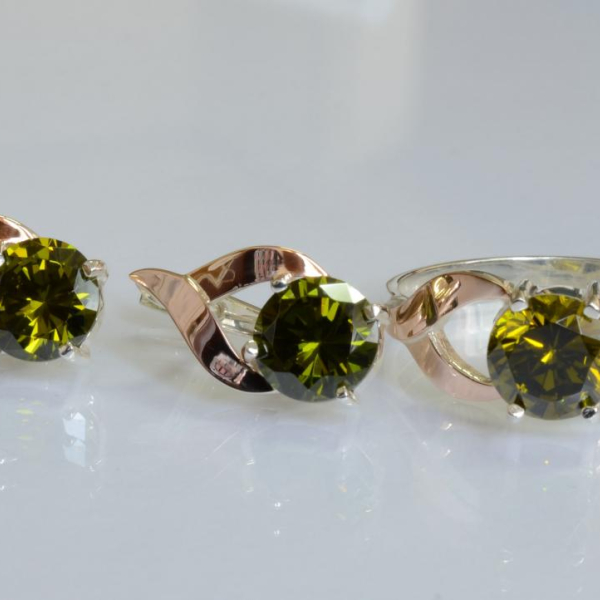 Срібний набір з золотими пластинами