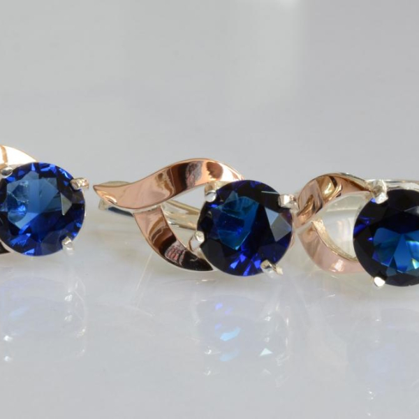 Срібний набір з золотими пластинами