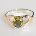 Срібна каблучка з золотими вставками