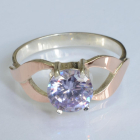 Срібна каблучка з золотими вставками