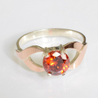 Срібна каблучка з золотими вставками