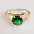 Срібна каблучка з золотими вставками