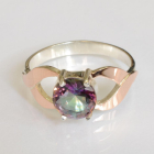 Срібна каблучка з золотими вставками