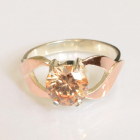 Срібна каблучка з золотими вставками