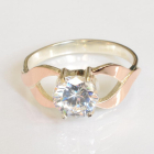 Срібна каблучка з золотими вставками