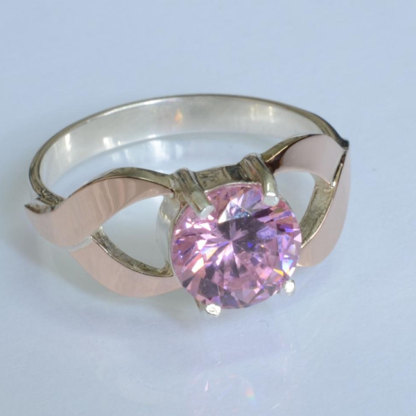 Срібна каблучка з золотими вставками