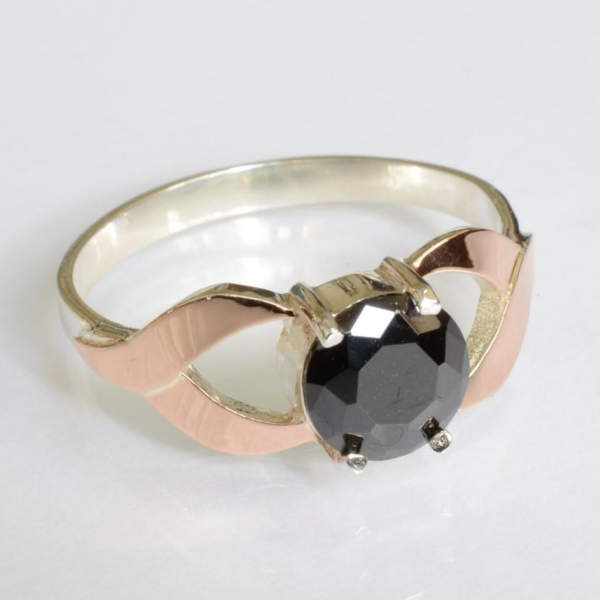 Срібна каблучка з золотими вставками