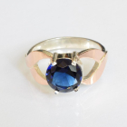 Срібна каблучка з золотими вставками