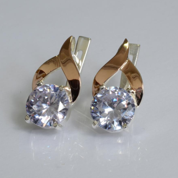 Срібні сережки з золотими пластинами