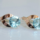 Срібні сережки з золотими пластинами