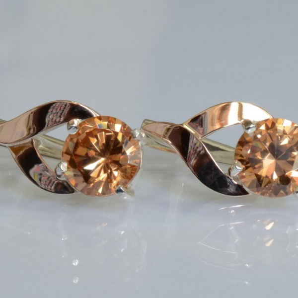 Срібні сережки з золотими пластинами