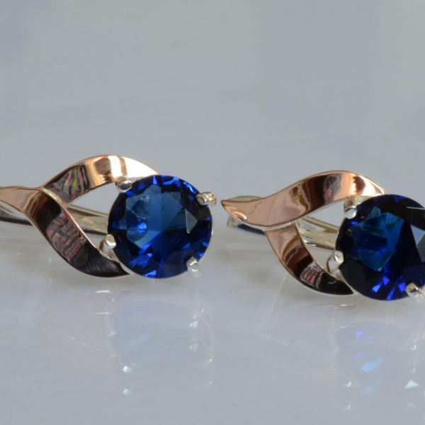 Срібні сережки з золотими пластинами